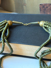 Load image into Gallery viewer, Vintage Multi Stranded Green Beaded Necklace with Brass Charm
