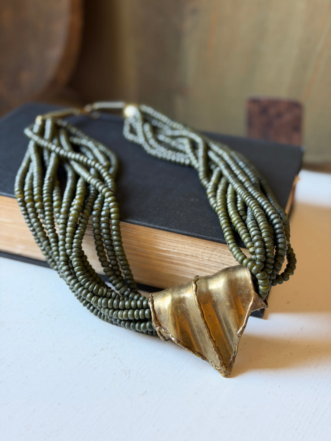 Vintage Multi Stranded Green Beaded Necklace with Brass Charm