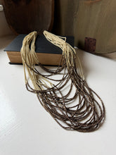 Load image into Gallery viewer, Long Cream &amp; Brass Beaded Necklace
