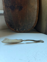 Load image into Gallery viewer, WM A Rogers Silverplate Twisted Handle Butter Knife
